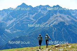 06.09.2011, Scuol, Switzerland (SUI): l-r: Sanna Kullberg (FIN), TEAM BUFF THERMOCOOL, Maija Oravamaki (FIN), TEAM BUFF THERMOCOOL    - Gore Tex Transalpine Run, trail running, 40km, Galtuer (AUT) - Scuol (SUI). www.nordicfocus.com. © NordicFocus. Every downloaded picture is fee-liable.