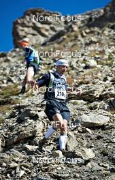06.09.2011, Scuol, Switzerland (SUI): Miguel Caballero Ortega (ESP),TEAM TRANGOWORLD GORE-TEX SPAIN II     - Gore Tex Transalpine Run, trail running, 40km, Galtuer (AUT) - Scuol (SUI). www.nordicfocus.com. © NordicFocus. Every downloaded picture is fee-liable.
