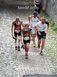 07.09.2011, Scuol, Switzerland (SUI): Maija Oravamaki (FIN), TEAM BUFF THERMOCOOL and Sanna Kullberg (FIN), TEAM BUFF THERMOCOOL    - Gore Tex Transalpine Run, trail running, 6km, Scuol (SUI). www.nordicfocus.com. © NordicFocus. Every downloaded picture is fee-liable.