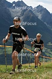 07.09.2011, Scuol, Switzerland (SUI): slower racers on the way to the top   - Gore Tex Transalpine Run, trail running, 6km, Scuol (SUI). www.nordicfocus.com. © NordicFocus. Every downloaded picture is fee-liable.