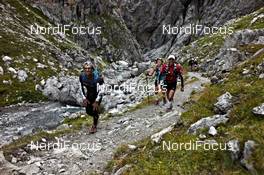 08.09.2011, Mals, Italy (ITA): slower racers leave the Uina valley   - Gore Tex Transalpine Run, trail running, 39km, Scuol (SUI) - Mals (ITA). www.nordicfocus.com. © NordicFocus. Every downloaded picture is fee-liable.