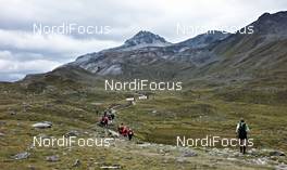 08.09.2011, Mals, Italy (ITA): slower racers near Schlinigpass   - Gore Tex Transalpine Run, trail running, 39km, Scuol (SUI) - Mals (ITA). www.nordicfocus.com. © NordicFocus. Every downloaded picture is fee-liable.