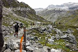 08.09.2011, Mals, Italy (ITA): slower racers leave the Uina valley   - Gore Tex Transalpine Run, trail running, 39km, Scuol (SUI) - Mals (ITA). www.nordicfocus.com. © NordicFocus. Every downloaded picture is fee-liable.
