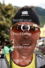 09.09.2011, Schlanders, Italy (ITA): faces in the finish   - Gore Tex Transalpine Run, trail running, 37km, Mals (ITA) - Schlanders (ITA). www.nordicfocus.com. © NordicFocus. Every downloaded picture is fee-liable.