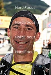 09.09.2011, Schlanders, Italy (ITA): faces in the finish   - Gore Tex Transalpine Run, trail running, 37km, Mals (ITA) - Schlanders (ITA). www.nordicfocus.com. © NordicFocus. Every downloaded picture is fee-liable.