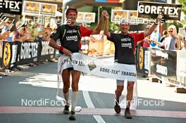 10.09.2011, Latsch, Italy (ITA): celebrations in the finish of Latsch   - Gore Tex Transalpine Run, trail running, 30km, Schlanders (ITA) - Latsch (ITA). www.nordicfocus.com. © NordicFocus. Every downloaded picture is fee-liable.