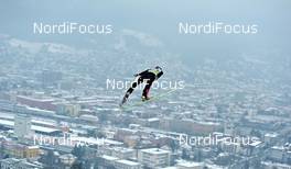 03.01.2011, Innsbruck, Austria (AUT): Jan Matura (CZE), Fischer, flying above Innsbruck  - FIS world cup ski jumping, four hills tournament, individual HS130, Innsbruck (AUT). www.nordicfocus.com. Â© Felgenhauer/NordicFocus. Every downloaded picture is fee-liable.