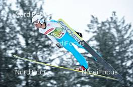 03.01.2011, Innsbruck, Austria (AUT): Vincent Descombes Sevoie (FRA), Fischer  - FIS world cup ski jumping, four hills tournament, individual HS130, Innsbruck (AUT). www.nordicfocus.com. Â© Felgenhauer/NordicFocus. Every downloaded picture is fee-liable.