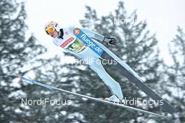 03.01.2011, Innsbruck, Austria (AUT): Alexey Korolev (RUS), fluege.de  - FIS world cup ski jumping, four hills tournament, individual HS130, Innsbruck (AUT). www.nordicfocus.com. Â© Felgenhauer/NordicFocus. Every downloaded picture is fee-liable.
