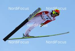 12.03.2011, Lahti, Finland (FIN):  Tom Hilde (NOR), Fischer - FIS world cup ski jumping, team HS130, Lahti (FIN). www.nordicfocus.com. © Laiho/NordicFocus. Every downloaded picture is fee-liable.