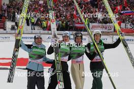 19.03.2011, Planica, Slovenia (SLO): 3rd Team Slovenia (l-r): Jernej Damjan (SLO), Fischer, Peter Prevc (SLO), Elan, Robert Kranjec (SLO), Fischer, Jurij Tepes (SLO), Fischer  - FIS world cup ski jumping final, team HS215, Planica (SLO). www.nordicfocus.com. © Hemmersbach/NordicFocus. Every downloaded picture is fee-liable.