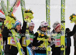 19.03.2011, Planica, Slovenia (SLO): todays winner Team Austria, l-r: Gregor Schlierenzauer (AUT), Fischer, Andreas Kofler (AUT), Fischer, Martin Koch (AUT), Fischer, Thomas Morgenstern (AUT), Fischer  - FIS world cup ski jumping final, team HS215, Planica (SLO). www.nordicfocus.com. © Hemmersbach/NordicFocus. Every downloaded picture is fee-liable.