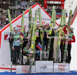 19.03.2011, Planica, Slovenia (SLO): podium, l-r: 3rd Team Slovenia, 1st Team Austria, 2nd Team Norway - FIS world cup ski jumping final, team HS215, Planica (SLO). www.nordicfocus.com. © Hemmersbach/NordicFocus. Every downloaded picture is fee-liable.