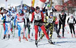 23.01.2010, Lienz, Austria (AUT): l-r: Fabio Santus, (ITA), Fischer, Alpina, Swix, Aliaksei Ivanou (BLR), Skinfit, Fischer, KV+,  - FIS Marathon Cup Dolomitenlauf, Lienz (AUT). www.nordicfocus.com. © Felgenhauer/NordicFocus. Every downloaded picture is fee-liable.