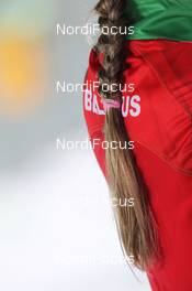 06.01.2012, Oberhof, Germany (GER): Biathlon Feature: the hair of Darya Domracheva (BLR), Fischer, Rottefella, Leki - IBU world cup biathlon, sprint women, Oberhof (GER). www.nordicfocus.com. © Manzoni/NordicFocus. Every downloaded picture is fee-liable.