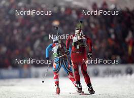06.01.2012, Oberhof, Germany (GER): Olga Zaitseva (RUS), Madshus, Rottefella, Alpina, adidas, Synnoeve Solemdal (NOR), Madshus, Rottefella, Swix, ODLO - IBU world cup biathlon, sprint women, Oberhof (GER). www.nordicfocus.com. © Manzoni/NordicFocus. Every downloaded picture is fee-liable.