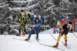 21.01.2012, Antholz, Italy (ITA): Martin Fourcade (FRA), Rossignol, Rottefella, OneWay, Odlo, Fredrik Lindstroem (SWE), Fischer, Rottefella, Swix, adidas, Andreas Birnbacher (GER), Fischer, Rottefella, Alpina, Leki, adidas - IBU world cup biathlon, mass men, Antholz (ITA). www.nordicfocus.com. © Manzoni/NordicFocus. Every downloaded picture is fee-liable.