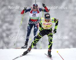 21.01.2012, Antholz, Italy (ITA): Martin Fourcade (FRA), Rossignol, Rottefella, OneWay, Odlo, Tim Burke (USA), Rossignol, Rottefella, OneWay, adidas - IBU world cup biathlon, mass men, Antholz (ITA). www.nordicfocus.com. © Manzoni/NordicFocus. Every downloaded picture is fee-liable.