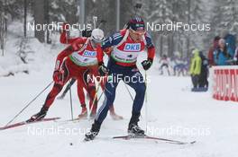 17.03.2012, Khanty-Mansiysk, Russia (RUS): Tim Burke (USA), Rossignol, Rottefella, OneWay, adidas leads Emil Hegle Svendsen (NOR), Madshus, Rottefella, Swix, Odlo - IBU world cup biathlon, pursuit men, Khanty-Mansiysk (RUS). www.nordicfocus.com. © Manzoni/NordicFocus. Every downloaded picture is fee-liable.