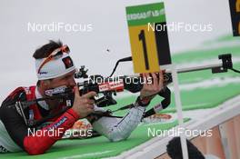 06.03.2012, Ruhpolding, Germany (GER): Jean Philippe Leguellec (CAN), Rossignol, Rottefella, Swix - IBU world championships biathlon, individual men, Ruhpolding (GER). www.nordicfocus.com. © Manzoni/NordicFocus. Every downloaded picture is fee-liable.