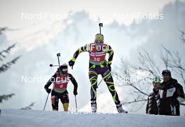 07.03.2012, Ruhpolding, Germany (GER): l-r: Andrea Henkel (GER), Fischer, Rottefella, Swix, adidas, Toko, Marie Laure Brunet (FRA), Rossignol, Rottefella, Swix - IBU world championships biathlon, individual women, Ruhpolding (GER). www.nordicfocus.com. © Felgenhauer/NordicFocus. Every downloaded picture is fee-liable.