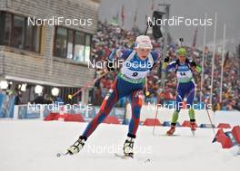 11.03.2012, Ruhpolding, Germany (GER): l-r: Kaisa Maekaeraeinen (FIN), Fischer, Rottefella, Leki, Odlo, Teja Gregorin (SLO), Fischer, Rottefella, Alpina, Leki - IBU world championships biathlon, mass women, Ruhpolding (GER). www.nordicfocus.com. © Felgenhauer/NordicFocus. Every downloaded picture is fee-liable.