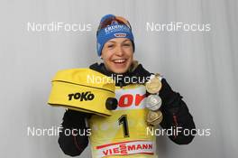 04.03.2012, Ruhpolding, Germany (GER): Magdalena Neuner (GER), Fischer, Rottefella, Swix, adidas, Toko - IBU world championships biathlon, medals, Ruhpolding (GER). www.nordicfocus.com. © Manzoni/NordicFocus. Every downloaded picture is fee-liable.