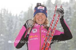 16.03.2012, Ruhpolding, Germany (GER): Anais Bescond (FRA), Madshus, Rottefella, Swix, OneWay - IBU world championships biathlon, medals, Ruhpolding (GER). www.nordicfocus.com. © Manzoni/NordicFocus. Every downloaded picture is fee-liable.