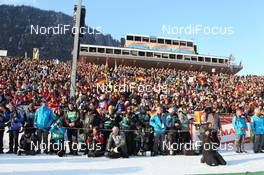 09.03.2012, Ruhpolding, Germany (GER): Event Feature: photographers wait for flower ceremony - IBU world championships biathlon, relay men, Ruhpolding (GER). www.nordicfocus.com. © Manzoni/NordicFocus. Every downloaded picture is fee-liable.