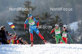 01.03.2012, Ruhpolding, Germany (GER): Olga Vilukhina (RUS), Fischer, Rottefella, Swix, adidas  - IBU world championships biathlon, relay mixed, Ruhpolding (GER). www.nordicfocus.com. © Manzoni/NordicFocus. Every downloaded picture is fee-liable.