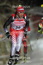 29.11.2012, Oestersund, Sweden (SWE): Scott Perras (CAN), Salomon, Swix - IBU world cup biathlon, individual men, Oestersund (SWE). www.nordicfocus.com. © Manzoni/NordicFocus. Every downloaded picture is fee-liable.