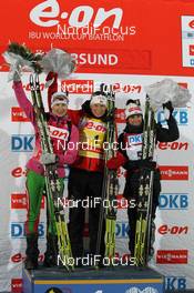 02.12.2012, Oestersund, Sweden (SWE): L-R: Darya Domracheva (BLR), Fischer, Rottefella, Leki, Tora Berger (NOR), Fischer, Rottefella, Odlo, Andrea Henkel (GER), Fischer, Rottefella, Swix, adidas, Toko - IBU world cup biathlon, pursuit women, Oestersund (SWE). www.nordicfocus.com. © Manzoni/NordicFocus. Every downloaded picture is fee-liable.
