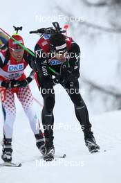 08.12.2012, Hochfilzen, Austria (AUT): Simon Hallenbarter (SUI), Rossignol, Rottefella, KV+, ODLO, Alpina - IBU world cup biathlon, pursuit men, Hochfilzen (AUT). www.nordicfocus.com. © Manzoni/NordicFocus. Every downloaded picture is fee-liable.