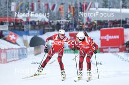 09.12.2012, Hochfilzen, Austria (AUT): Fanny Welle-Strand Horn (NOR), Madshus, Rottefella, Alpina, Swix, ODLO, Tora Berger (NOR), Fischer, Rottefella, Odlo - IBU world cup biathlon, relay women, Hochfilzen (AUT). www.nordicfocus.com. © Manzoni/NordicFocus. Every downloaded picture is fee-liable.