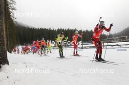 16.12.2012, Pokljuka, Slovenia (SLO): Start of the race with Emil Hegle Svendsen (NOR), Madshus, Rottefella, Swix, Odlo, Martin Fourcade (FRA), Rossignol, Rottefella, OneWay, Dominik Landertinger (AUT), Atomic, Alpina, Leki - IBU world cup biathlon, mass men, Pokljuka (SLO). www.nordicfocus.com. © Manzoni/NordicFocus. Every downloaded picture is fee-liable.