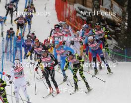 01.01.2012, Oberstdorf, Germany (GER): group, in the focus, l-r: Dario Cologna (SUI), Fischer, Rottefella, Alpina, Swix, Odlo and Maurice Manificat (FRA), Fischer, Swix, One Way  - FIS world cup cross-country, tour de ski, skiathlon men, Oberstdorf (GER). www.nordicfocus.com. © Hemmersbach/NordicFocus. Every downloaded picture is fee-liable.