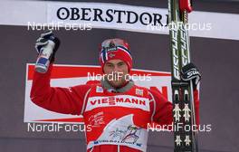 01.01.2012, Oberstdorf, Germany (GER): current Tour Leader Petter Northug (NOR), Fischer, Rottefella, Alpina, Ski Go, Swix   - FIS world cup cross-country, tour de ski, skiathlon men, Oberstdorf (GER). www.nordicfocus.com. © Hemmersbach/NordicFocus. Every downloaded picture is fee-liable.