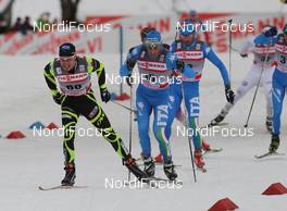 01.01.2012, Oberstdorf, Germany (GER): group, in front Robin Duvillard (FRA), Rossignol, Rottefella, Swix, One Way, behind Fabio Pasini (ITA), Fischer, Salomon, One Way  - FIS world cup cross-country, tour de ski, skiathlon men, Oberstdorf (GER). www.nordicfocus.com. © Hemmersbach/NordicFocus. Every downloaded picture is fee-liable.