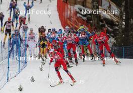 01.01.2012, Oberstdorf, Germany (GER): group, in front Niklas Dyrhaug (NOR), Fischer, Rottefella, Alpina, Swix, behind l-r: Sjur Roethe (NOR), Fischer, Salomon, Swix, Eldar Roenning (NOR), Rossignol, Rottefella, Swix, Petter Northug (NOR), Fischer, Rottefella, Alpina, Ski Go, Swix   - FIS world cup cross-country, tour de ski, skiathlon men, Oberstdorf (GER). www.nordicfocus.com. © Hemmersbach/NordicFocus. Every downloaded picture is fee-liable.