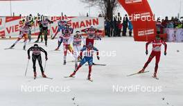 01.01.2012, Oberstdorf, Germany (GER): finish, l-r: Dario Cologna (SUI), Fischer, Rottefella, Alpina, Swix, Odlo, Maxim Vylegzhanin (RUS), Fischer, Rottefella, Alpina, Swix, adidas, Petter Northug (NOR), Fischer, Rottefella, Alpina, Ski Go, Swix   - FIS world cup cross-country, tour de ski, skiathlon men, Oberstdorf (GER). www.nordicfocus.com. © Hemmersbach/NordicFocus. Every downloaded picture is fee-liable.