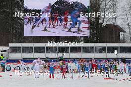 01.01.2012, Oberstdorf, Germany (GER): feature, athletes in the stadium under the big screen - FIS world cup cross-country, tour de ski, skiathlon men, Oberstdorf (GER). www.nordicfocus.com. © Hemmersbach/NordicFocus. Every downloaded picture is fee-liable.