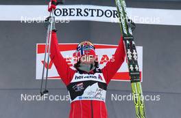 01.01.2012, Oberstdorf, Germany (GER): todays winner Marit Bjoergen (NOR), Fischer, Rottefella, Swix  - FIS world cup cross-country, tour de ski, skiathlon women, Oberstdorf (GER). www.nordicfocus.com. © Hemmersbach/NordicFocus. Every downloaded picture is fee-liable.