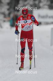 03.01.2012, Cortina-Toblach, Italy (ITA): Petter Northug (NOR), Fischer, Rottefella, Alpina, Ski Go, Swix   - FIS world cup cross-country, tour de ski, 5km men, Cortina-Toblach (ITA). www.nordicfocus.com. © Hemmersbach/NordicFocus. Every downloaded picture is fee-liable.