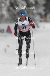 03.01.2012, Cortina-Toblach, Italy (ITA): Curdin Perl (SUI), Rossignol, Rottefella, Swix, Odlo  - FIS world cup cross-country, tour de ski, 5km men, Cortina-Toblach (ITA). www.nordicfocus.com. © Hemmersbach/NordicFocus. Every downloaded picture is fee-liable.