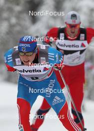 05.01.2012, Cortina-Toblach, Italy (ITA): Alexander Legkov (RUS), Rossignol, Rottefella, Swix, adidas, Petter Northug (NOR), Fischer, Rottefella, Alpina, Ski Go, Swix   - FIS world cup cross-country, tour de ski, pursuit men, Cortina-Toblach (ITA). www.nordicfocus.com. © Hemmersbach/NordicFocus. Every downloaded picture is fee-liable.