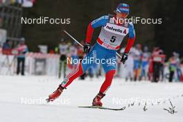 05.01.2012, Cortina-Toblach, Italy (ITA): Maxim Vylegzhanin (RUS), Fischer, Rottefella, Alpina, Swix, adidas  - FIS world cup cross-country, tour de ski, pursuit men, Cortina-Toblach (ITA). www.nordicfocus.com. © Hemmersbach/NordicFocus. Every downloaded picture is fee-liable.