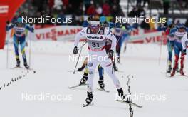 05.01.2012, Cortina-Toblach, Italy (ITA): group, in front Emil Joensson (SWE), Fischer, Salomon, Craft, Swix  - FIS world cup cross-country, tour de ski, pursuit men, Cortina-Toblach (ITA). www.nordicfocus.com. © Hemmersbach/NordicFocus. Every downloaded picture is fee-liable.