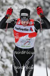 05.01.2012, Cortina-Toblach, Italy (ITA): Dario Cologna (SUI), Fischer, Rottefella, Alpina, Swix, Odlo  - FIS world cup cross-country, tour de ski, pursuit men, Cortina-Toblach (ITA). www.nordicfocus.com. © Hemmersbach/NordicFocus. Every downloaded picture is fee-liable.