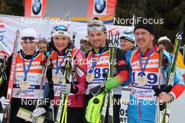 08.01.2012, Val di Fiemme, Italy (ITA): l-r: Katarina Neumannova (CZE), Petra Majdic (SLO), Georgy Kadikov (RUS), Michail Devjatjarov (RUS) - FIS world cup cross-country, tour de ski, rampa con i campioni, Val di Fiemme (ITA). www.nordicfocus.com. © Hemmersbach/NordicFocus. Every downloaded picture is fee-liable.