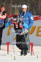 14.01.2012, Milano, Italy (ITA): Pierre Mignerey (FRA), FIS Race Director Assistant Cross Country testing the start box - FIS world cup cross-country, individual sprint, Milano (ITA). www.nordicfocus.com. © Hemmersbach/NordicFocus. Every downloaded picture is fee-liable.